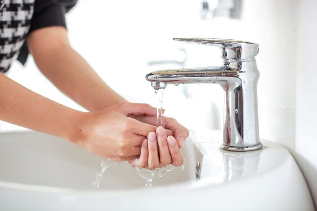 washing-hand-with-water-tap-2023-11-27-05-04-58-utc-1024x683