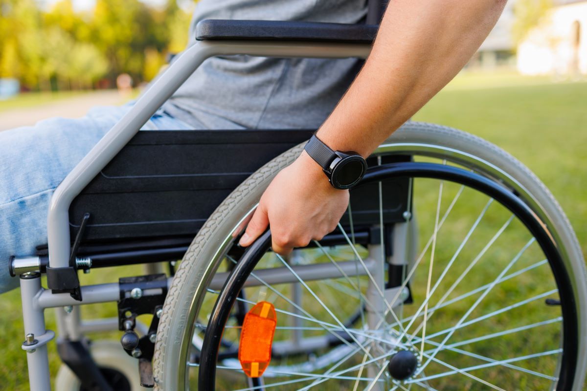 outdoor-accessibility-focus-on-hand-of-young-man-2024-10-18-08-22-20-utc